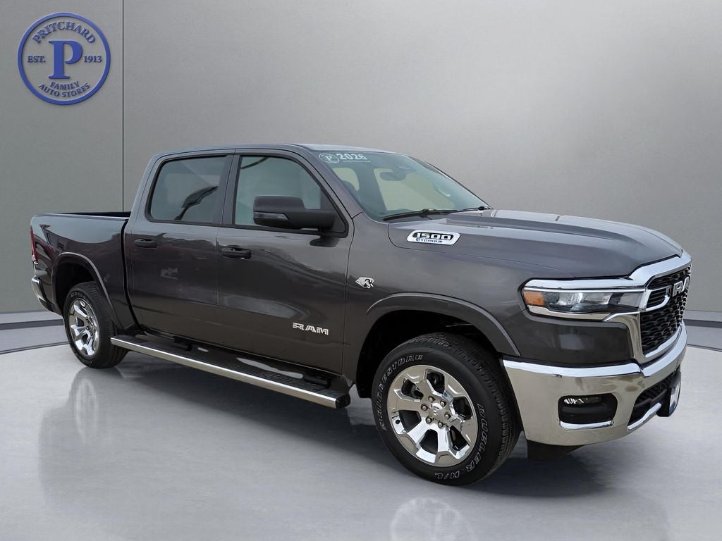2026 RAM Ram 1500 RAM 1500 BIG HORN CREW CAB 4X4 5'7' BOX in Granite Crystal Metallic Clear-Coat Exterior Paint — front three-quarter view