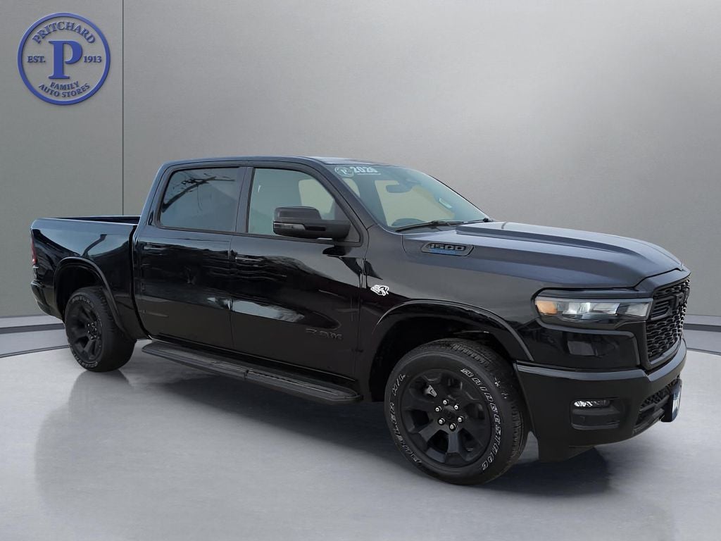 2026 RAM Ram 1500 RAM 1500 BIG HORN CREW CAB 4X4 5'7' BOX in Diamond Black Crystal Pearl-Coat Exterior Paint — front three-quarter view