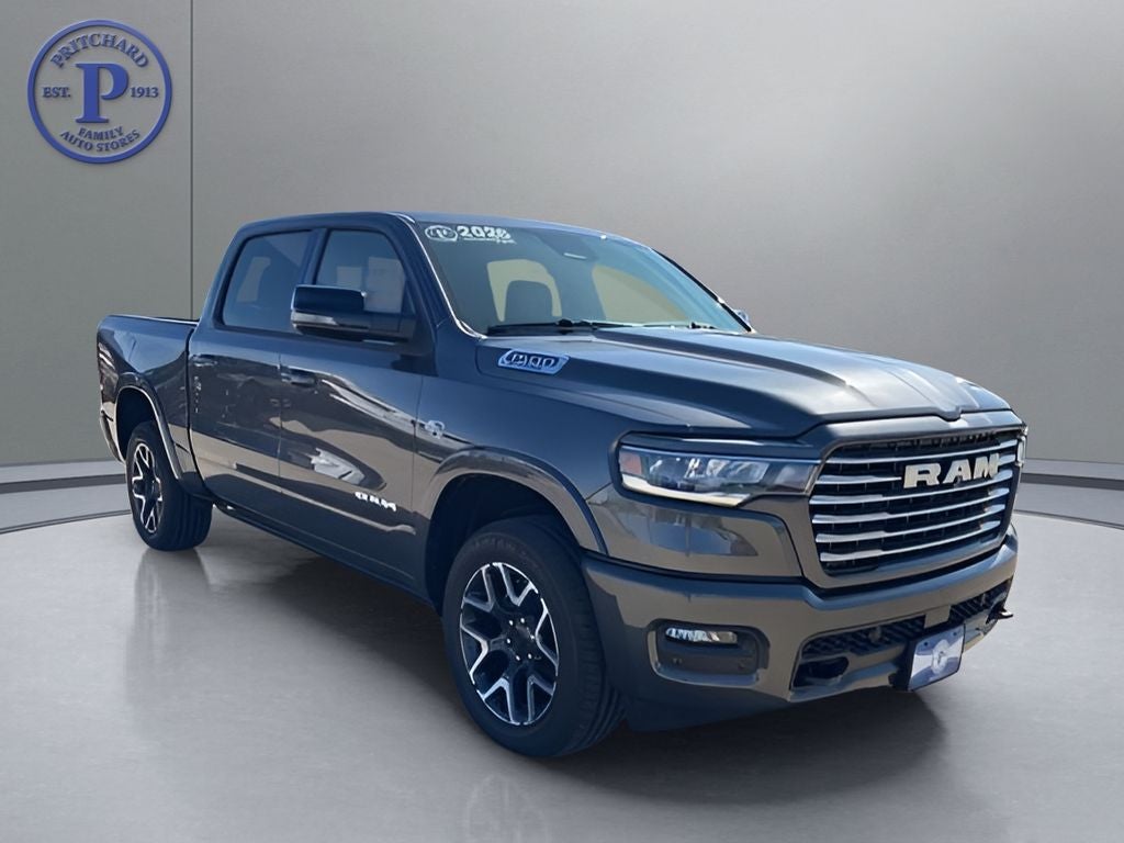 2026 RAM Ram 1500 RAM 1500 LARAMIE CREW CAB 4X4 5'7' BOX in Granite Crystal Metallic Clear-Coat Exterior Paint — front three-quarter view